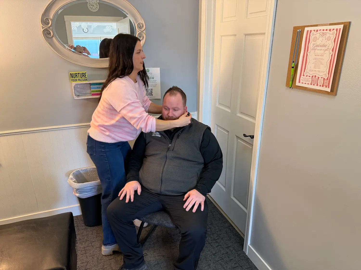 Patient receiving chiropractic care for a workplace injury at HealthMax Chiropractic of Hudson